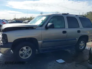 2003 Chevrolet Tahoe LS with VIN 1GNEC13V43R109837, listed as a IAAI auction lot 41363706 with Not provided miles and . Bid and sale history available at DreamBid. Image 14.