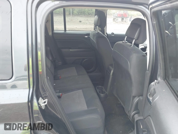 2014 Jeep Patriot Latitude with VIN 1C4NJRFB0ED641875, listed as a IAAI auction lot 42447186 with 137,499 mi miles and . Bid and sale history available at DreamBid. Image 8.