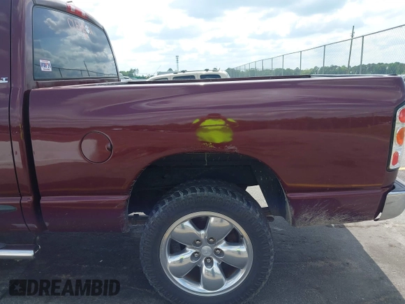 2002 Dodge 1500 with VIN 3D7HU18N52G148095, listed as a IAAI auction lot 42134042 with 180,369 mi miles. Bid and sale history available at carsss.com. Image 12.