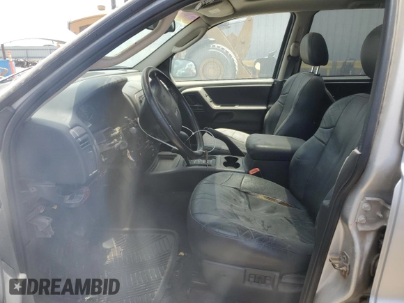 2002 Jeep Grand Cherokee Laredo with VIN 1J4GW48S52C242434, listed as a Copart auction lot 62859835 with 171,342 mi miles and Clean title. Bid and sale history available at DreamBid. Image 7.