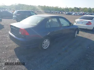 2004 Honda Civic LX with VIN 2HGES16534H643485, listed as a IAAI auction lot 42130844 with 143,007 mi miles. Bid and sale history available at carsss.com. Image 4.