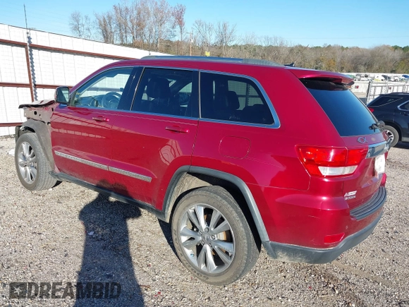 2013 Jeep Grand Cherokee Laredo with VIN 1C4RJEAG6DC636780, listed as a IAAI auction lot 41127701 with 135,026 mi miles. Bid and sale history available at carsss.com. Image 3.