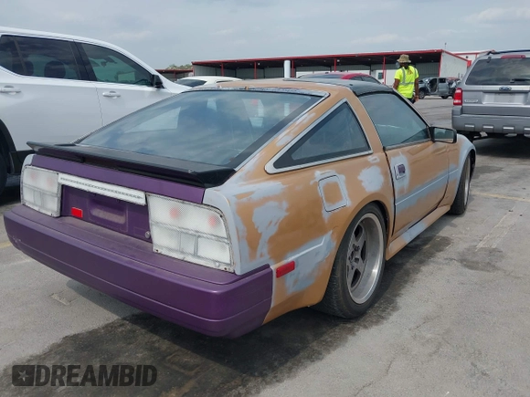 1986 Nissan 300ZX z VIN JN1HZ14S8GX144992, wystawiony jako IAAI lot #42081882 z przebiegiem 127 316 mil mil oraz . Historia ofert i sprzedaży dostępna na DreamBid. Obrazek 4.