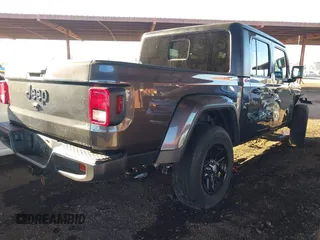 2021 Jeep Gladiator Willys with VIN 1C6HJTAG2ML507426, listed as a IAAI auction lot 41407608 with 49,554 mi miles and . Bid and sale history available at carsss.com. Image 4.