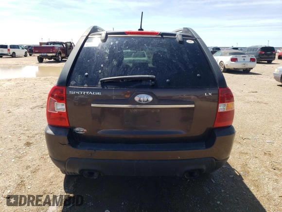 2009 Kia Sportage LX with VIN KNDJF724697568334, listed as a Copart auction lot 54056605 with 252,049 mi miles and Clean Title. Bid and sale history available at carsss.com. Image 6.