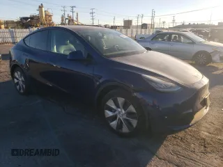 2021 Tesla Model Y Long Range with VIN 5YJYGDEE8MF148849, listed as a Copart auction lot 80894154 with 61,022 mi miles and Salvage Title. Bid and sale history available at carsss.com. Image 4.