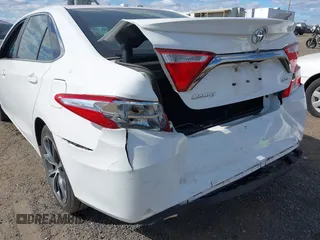2015 Toyota Camry XLE with VIN 4T1BF1FK8FU040068, listed as a IAAI auction lot 40521641 with 25,156 mi miles and . Bid and sale history available at DreamBid. Image 18.