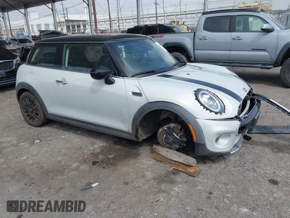 2021 MINI Hardtop Cooper with VIN WMWXR3C09M2N96671, listed as a IAAI auction lot 42031023 with 12,450 mi miles and . Bid and sale history available at DreamBid. Image 1.