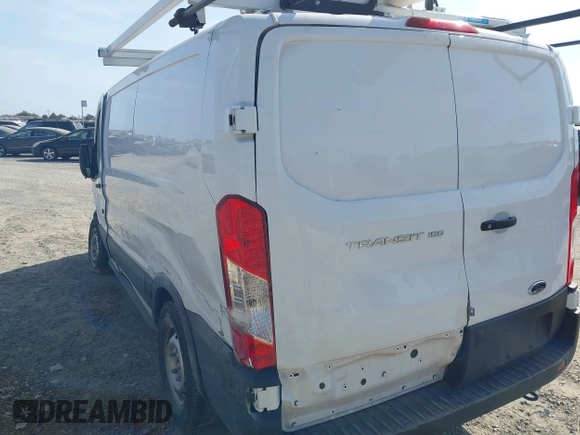 2023 Ford Transit Cargo z VIN 1FTYE1Y81PKB53926, wystawiony jako IAAI lot #42514906 z przebiegiem 52 410 mil mil oraz . Historia ofert i sprzedaży dostępna na DreamBid. Obrazek 3.
