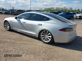 2012 Tesla Model S Performance with VIN 5YJSA1DP3CFP01348, listed as a IAAI auction lot 42185490 with 181,217 mi miles and . Bid and sale history available at DreamBid. Image 3.
