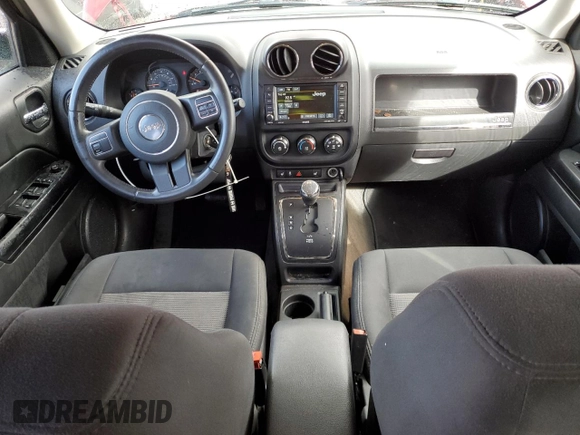 2014 Jeep Patriot Latitude with VIN 1C4NJRFB1ED651525, listed as a Copart auction lot 52526975 with 135,088 mi miles and Salvage Title. Bid and sale history available at carsss.com. Image 8.