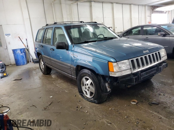 1994 Jeep Grand Cherokee Laredo with VIN 1J4FX58S0RC316030, listed as a Copart auction lot 66178754 with 281,785 mi miles and Salvage Title. Bid and sale history available at carsss.com. Image 4.