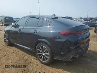 2021 BMW X6 M50i with VIN 5UXCY8C04M9E36899, listed as a Copart auction lot 68819334 with 72,808 mi miles and Salvage Title. Bid and sale history available at carsss.com. Image 2.
