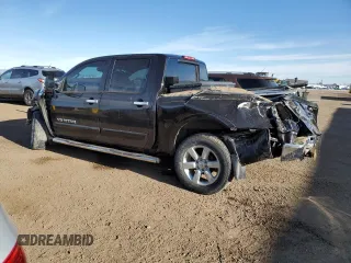 2013 Nissan Titan SV with VIN 1N6AA0EC1DN310572, listed as a Copart auction lot 50017235 with 114,349 mi miles and Salvage title. Bid and sale history available at DreamBid. Image 2.