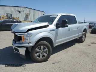 2019 Ford F-150 XL with VIN 1FTFW1E59KKC70287, listed as a Copart auction lot 52596015 with 113,089 mi miles and Salvage Title. Bid and sale history available at carsss.com. Image 1.