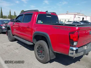 2018 Toyota Tacoma SR5 with VIN 3TMAZ5CN2JM067292, listed as a IAAI auction lot 41851959 with 70,988 mi miles and . Bid and sale history available at DreamBid. Image 14.