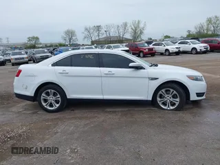 2017 Ford Taurus SEL with VIN 1FAHP2E86HG112643, listed as a IAAI auction lot 42162386 with 83,884 mi miles and . Bid and sale history available at DreamBid. Image 14.