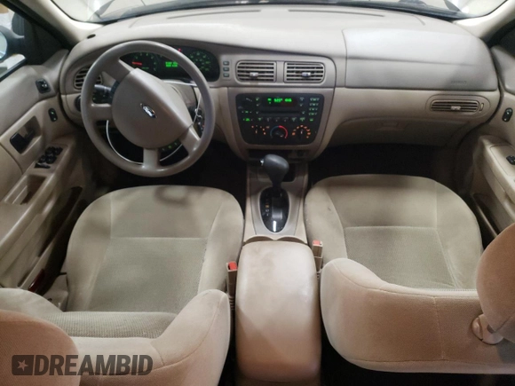2005 Ford Taurus SE with VIN 1FAFP53U15A276082, listed as a Copart auction lot 52015285 with 103,479 mi miles and Salvage Title. Bid and sale history available at carsss.com. Image 8.