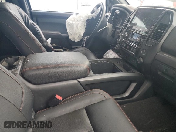 2021 Nissan Titan Pro-4X with VIN 1N6AA1ED0MN528002, listed as a Copart auction lot 54779885 with 33,235 mi miles and Salvage title. Bid and sale history available at DreamBid. Image 7.