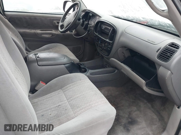 2003 Toyota Tundra SR5 with VIN 5TBBT44113S350273, listed as a IAAI auction lot 40482066 with 219,831 mi miles and . Bid and sale history available at DreamBid. Image 5.