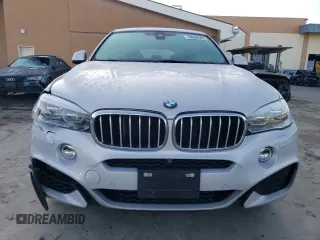 2016 BMW X6 xDrive50i with VIN 5UXKU6C51G0R33762, listed as a Copart auction lot 78698463 with 69,901 mi miles. Bid and sale history available at carsss.com. Image 5.