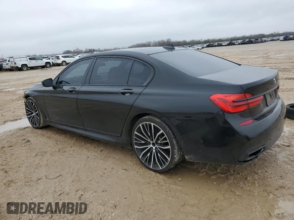 2019 BMW 7 Series 750i с VIN WBA7F0C57KGM24867, выставлен на аукционе Copart как лот 44438835 с пробегом 93 311 миль миль и Списание • Salvage title. История ставок и продаж доступна на DreamBid. Изображение 2.