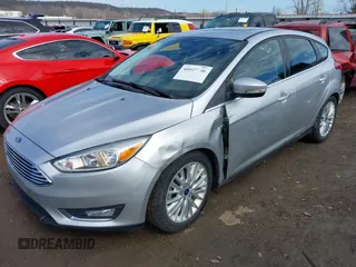2017 Ford Focus Titanium with VIN 1FADP3N26HL309903, listed as a IAAI auction lot 41642306 with 107,762 mi miles and . Bid and sale history available at carsss.com. Image 6.