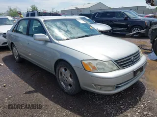 2003 Toyota Avalon XL z VIN 4T1BF28B73U310888, wystawiony jako IAAI lot #42133249 z przebiegiem 195 868 mil mil oraz . Historia ofert i sprzedaży dostępna na DreamBid. Obrazek 1.
