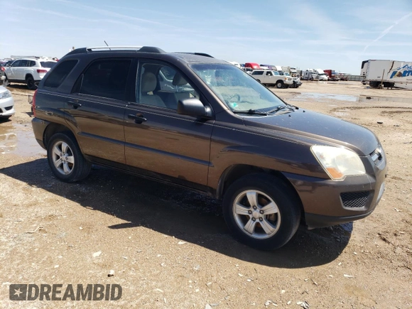 2009 Kia Sportage LX with VIN KNDJF724697568334, listed as a Copart auction lot 54056605 with 252,049 mi miles and Clean Title. Bid and sale history available at carsss.com. Image 4.
