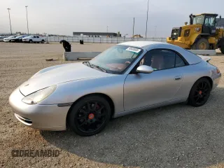 1999 Porsche 911 z VIN WP0CA2991XS655483, wystawiony jako Copart lot #59808895 z przebiegiem 117 722 mil mil oraz Czysty tytuł • Clean title. Historia ofert i sprzedaży dostępna na DreamBid. Obrazek 1.