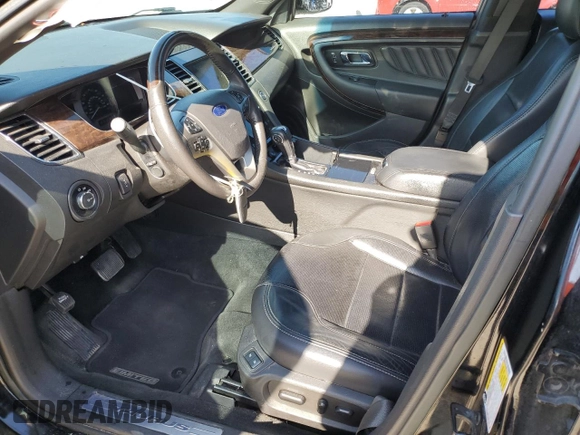 2017 Ford Taurus Limited with VIN 1FAHP2F84HG111702, listed as a Copart auction lot 54694325 with 114,533 mi miles and Salvage Title. Bid and sale history available at DreamBid. Image 7.