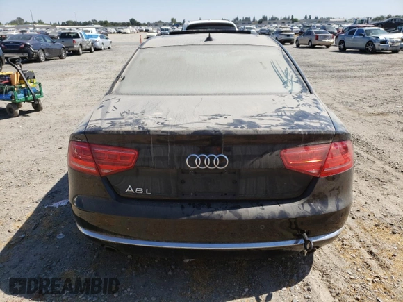 2013 Audi A8 3.0L with VIN WAURGAFD9DN004556, listed as a Copart auction lot 65018975 with 138,090 mi miles and Salvage title. Bid and sale history available at DreamBid. Image 6.