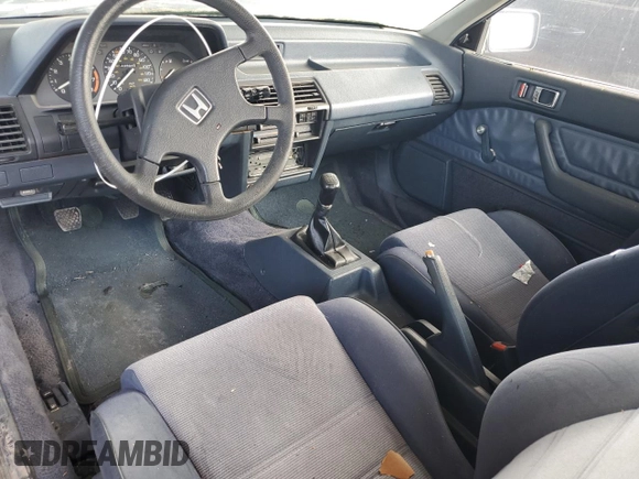 1986 Honda Accord z VIN JHMBA532XGC017525, wystawiony jako Copart lot #69079264 z przebiegiem 143 898 mil mil oraz Czysty tytuł • Clean title. Historia ofert i sprzedaży dostępna na DreamBid. Obrazek 8.