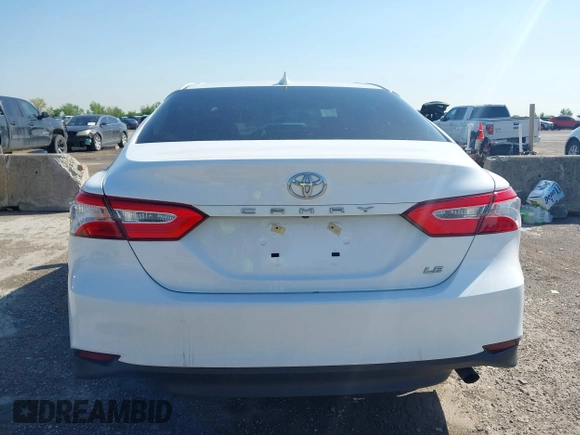 2019 Toyota Camry LE with VIN 4T1B11HK9KU825107, listed as a IAAI auction lot 41971159 with 15,802 mi miles and . Bid and sale history available at DreamBid. Image 16.