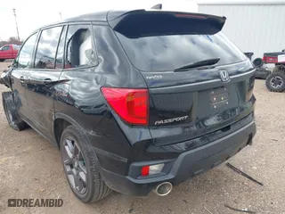 2022 Honda Passport EX-L with VIN 5FNYF7H51NB000270, listed as a IAAI auction lot 41206414 with 61,161 mi miles. Bid and sale history available at carsss.com. Image 3.