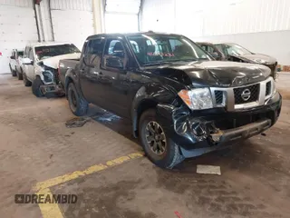 2018 Nissan Frontier SV with VIN 1N6AD0EVXJN765666, listed as a IAAI auction lot 41593221 with 125,115 mi miles and . Bid and sale history available at DreamBid. Image 1.