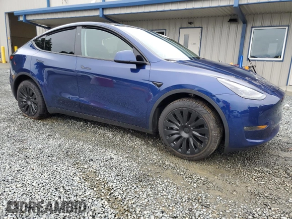 2024 Tesla Model Y Long Range with VIN 7SAYGDEE2RA246685, listed as a Copart auction lot 58699895 with 15,803 mi miles and Salvage title. Bid and sale history available at DreamBid. Image 4.