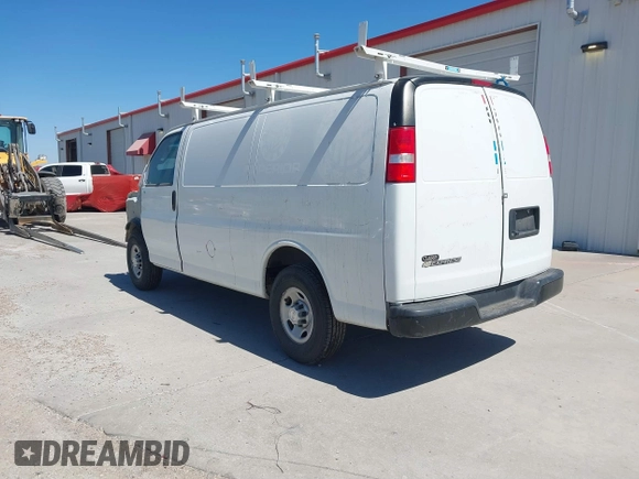 2018 Chevrolet Express Cargo Van with VIN 1GCWGAFP6J1332570, listed as a IAAI auction lot 41482103 with 142,405 mi miles. Bid and sale history available at carsss.com. Image 3.