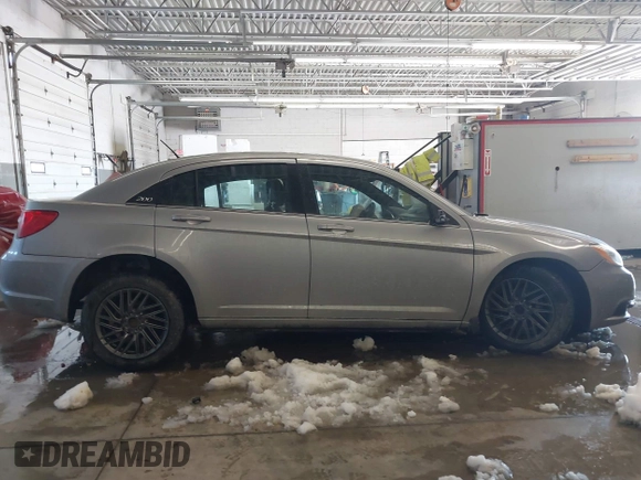 2013 Chrysler 200 Touring with VIN 1C3CCBBB5DN602677, listed as a IAAI auction lot 41644651 with 183,556 mi miles. Bid and sale history available at carsss.com. Image 14.