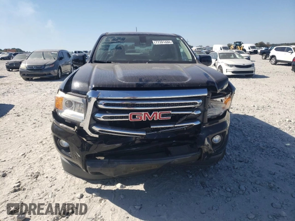 2015 GMC Canyon 2WD SLE with VIN 1GTG5BEA6F1221120, listed as a Copart auction lot 77391484 with 180,334 mi miles and Salvage Title. Bid and sale history available at carsss.com. Image 5.