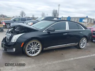 2013 Cadillac XTS Platinum z VIN 2G61V5S37D9194227, wystawiony jako IAAI lot #41510449 z przebiegiem 114 243 mil mil oraz . Historia ofert i sprzedaży dostępna na DreamBid. Obrazek 14.