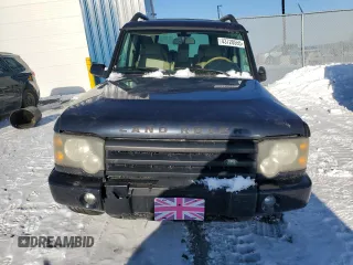 2004 Land Rover Discovery SE with VIN SALTY19464A867638, listed as a Copart auction lot 43728555 with 239,285 mi miles and Salvage Title. Bid and sale history available at carsss.com. Image 5.