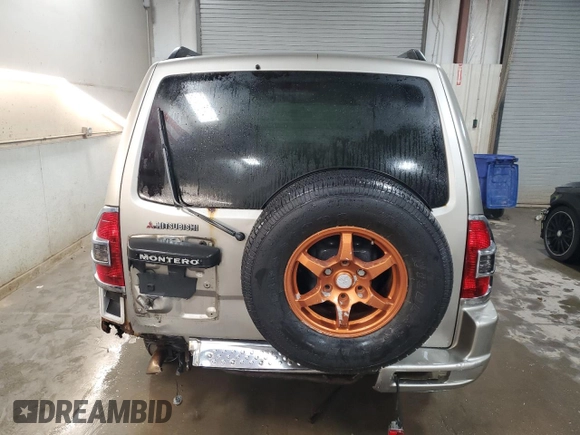 2001 Mitsubishi Montero Limited z VIN JA4MW51R71J038583, wystawiony jako Copart lot #83024384 z przebiegiem 157 538 mil mil oraz Szkoda całkowita • Salvage title. Historia ofert i sprzedaży dostępna na DreamBid. Obrazek 6.