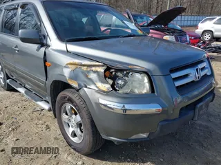 2007 Honda Pilot EX-L with VIN 5FNYF28737B001928, listed as a IAAI auction lot 41311134 with 243,870 mi miles. Bid and sale history available at carsss.com. Image 6.