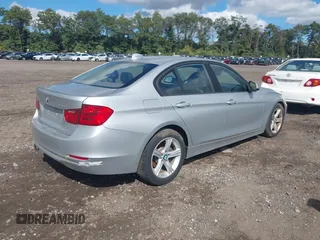 2013 BMW 3 Series 328i xDrive with VIN WBA3B5G54DNS00178, listed as a IAAI auction lot 40471342 with 68,209 mi miles and . Bid and sale history available at DreamBid. Image 4.