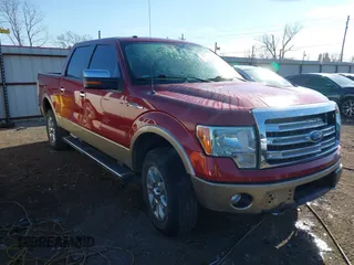 2014 Ford F-150 XL with VIN 1FTFW1EF5EKD04996, listed as a IAAI auction lot 40994056 with 147,285 mi miles. Bid and sale history available at carsss.com. Image 1.