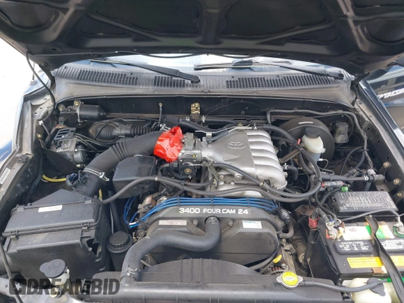 2003 Toyota Tacoma PreRunner z VIN 5TEGN92N03Z210194, wystawiony jako IAAI lot #42243037 z przebiegiem 241 047 mil mil oraz . Historia ofert i sprzedaży dostępna na DreamBid. Obrazek 10.