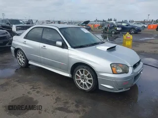 2005 Subaru Impreza Sedan (Natl) WRX STi w/Gold Wheels with VIN JF1GD70675L510065, listed as a IAAI auction lot 41092820 with 90,641 mi miles. Bid and sale history available at carsss.com. Image 1.