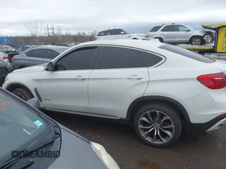 2015 BMW X6 xDrive35i with VIN 5UXKU2C57F0N77194, listed as a IAAI auction lot 41818860 with 105,579 mi miles and . Bid and sale history available at DreamBid. Image 14.