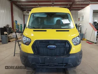 2023 Ford Transit Cargo with VIN 1FTBR2C88PKB17299, listed as a IAAI auction lot 41951132 with 19,461 mi miles and . Bid and sale history available at DreamBid. Image 12.